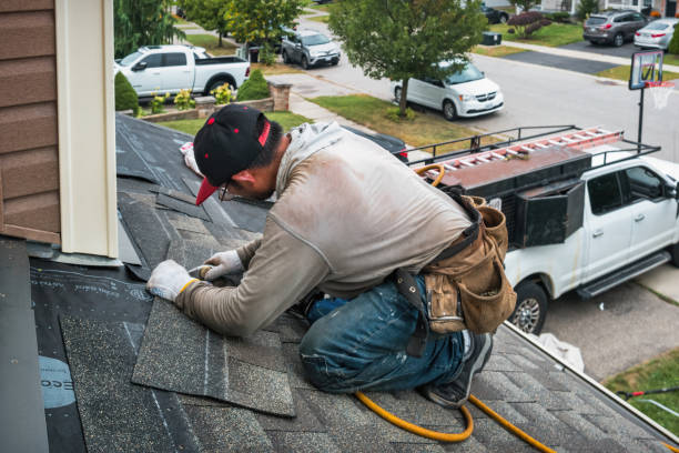 Professional Roofing technician working in Kingsley, MI